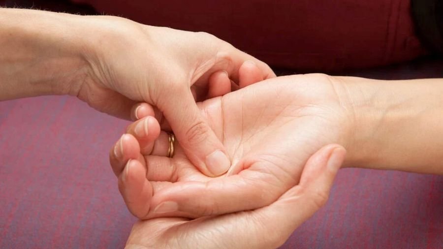Reflexology pressure on the palm